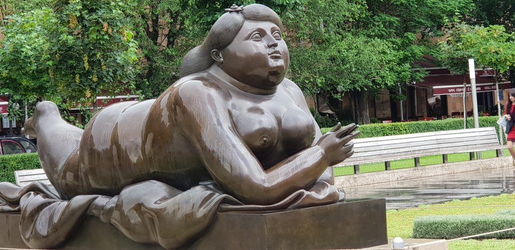The Botero sculpture of a smoking woman in the cascade courtyard