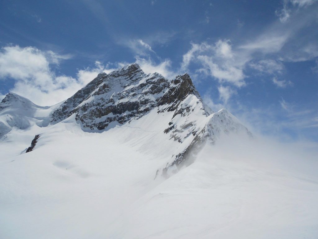 Humongous snow-peaked mountains of Jungfraujoch - "Top of Europe"