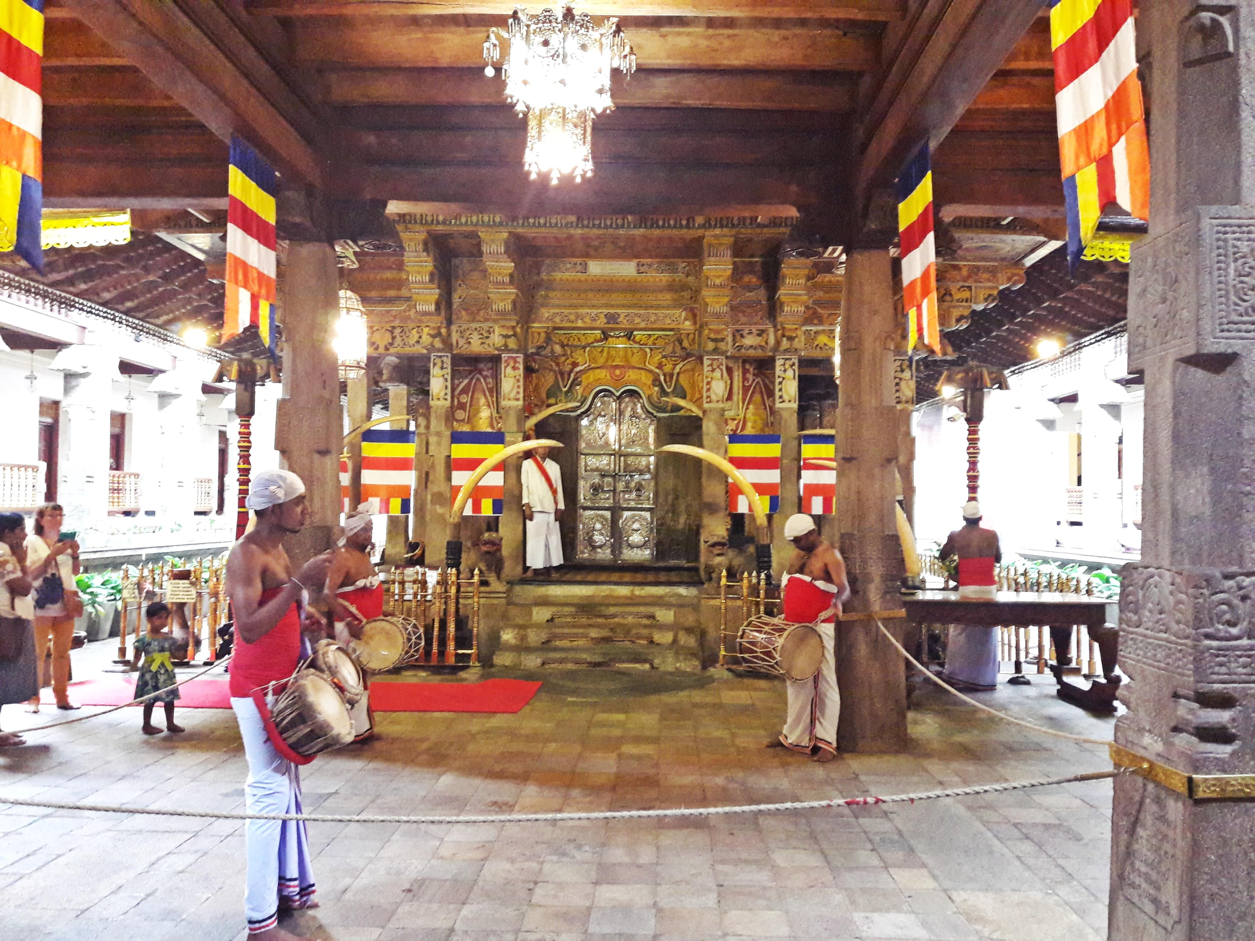 The traditional ceremony happening inside the Temple of Tooth Relic