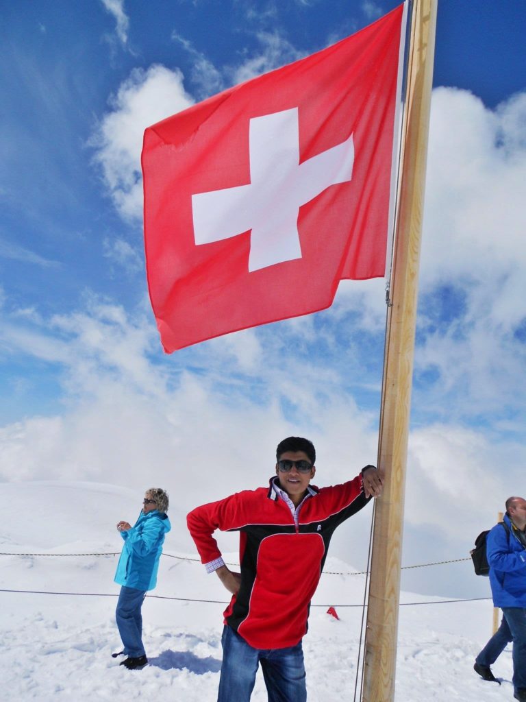 Me feeling like a diplomat fake-hoisting the Swiss flag!