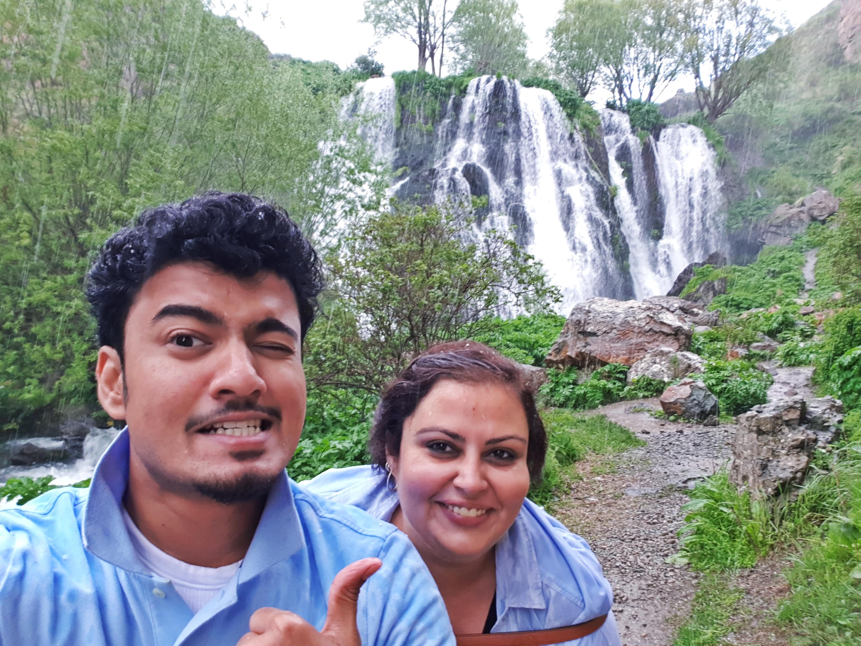 Selfie time with Ava at the Shaki waterfall just when it began raining