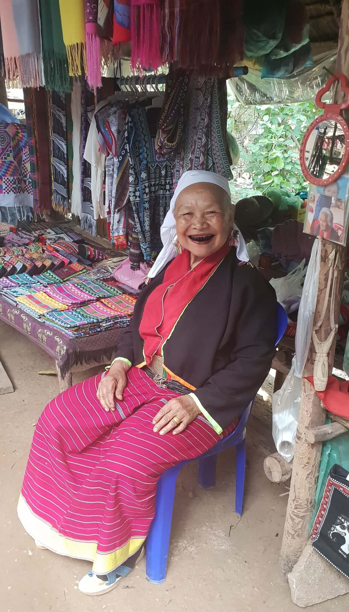 A smiling woman from the Palong tribe