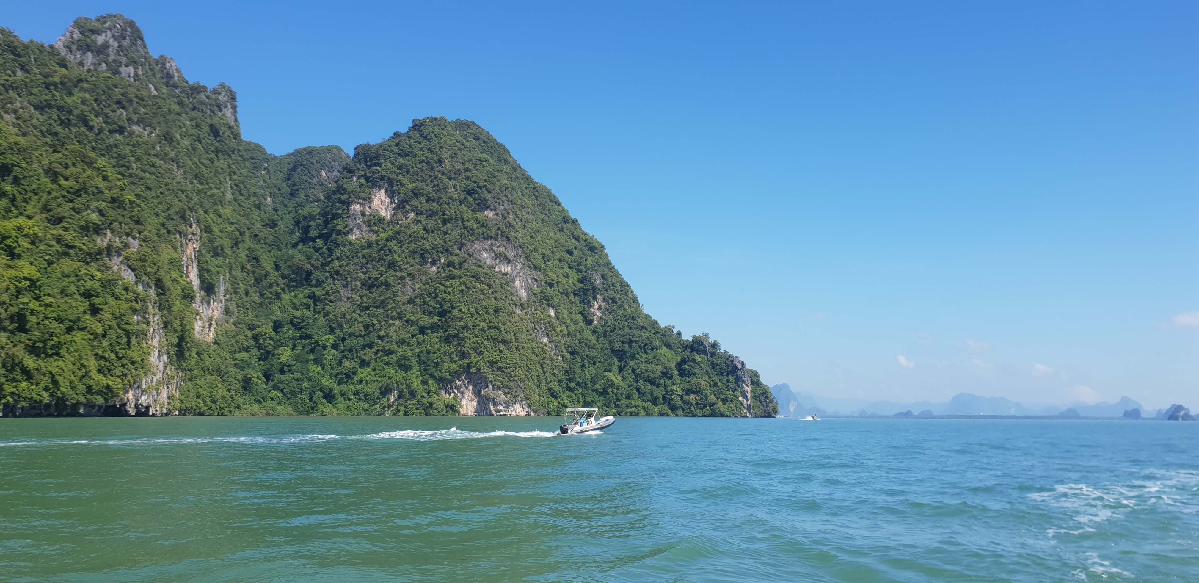 Enjoy cruising in the sea passing by hundreds of rocky limestone outcrops.
