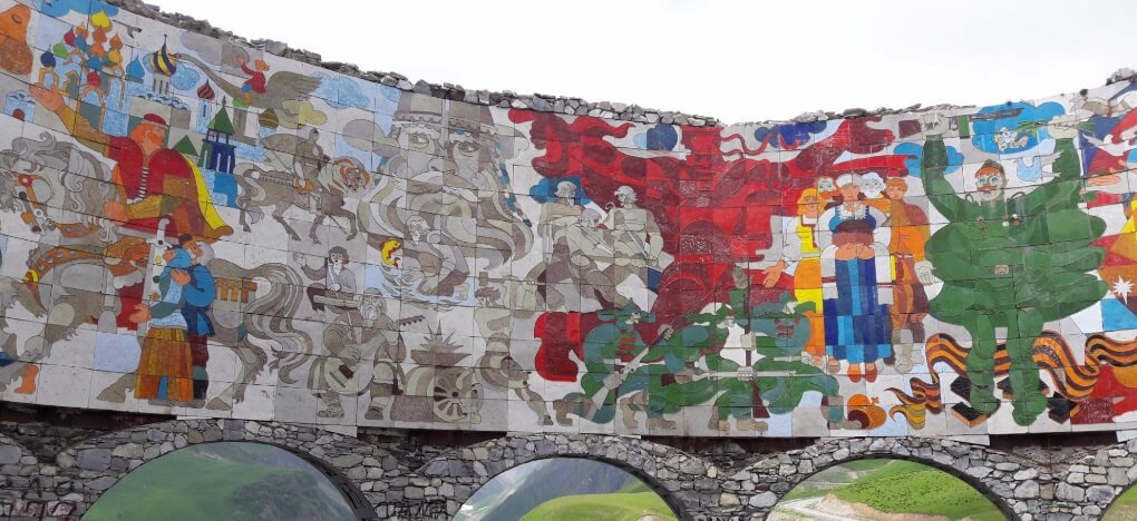 Colourful tile murals inside the Russia Georgia Friendship monument