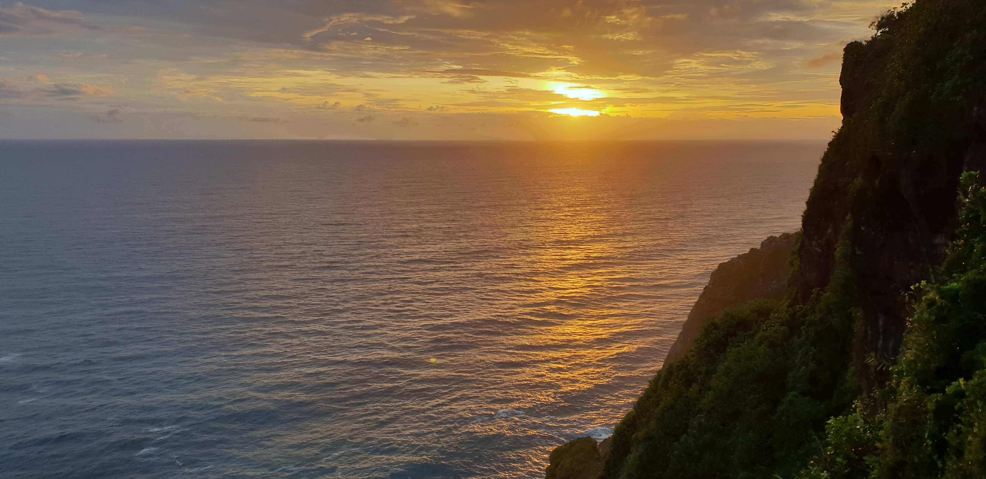The majestic sunset as seen from Oneeighty° clifftop club