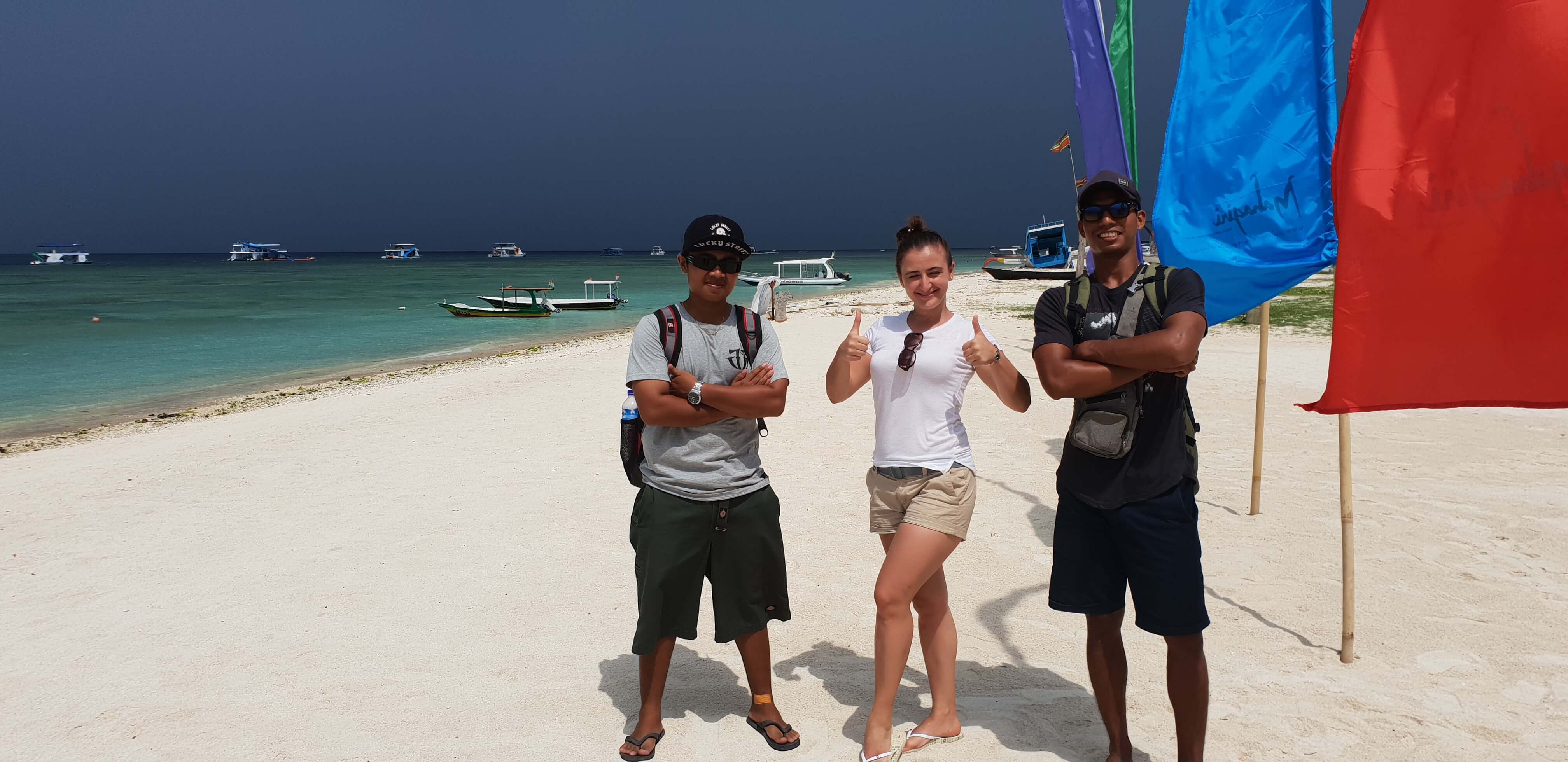 My friend Marinela along with our two biker guides at the stunning Mahagiri beach