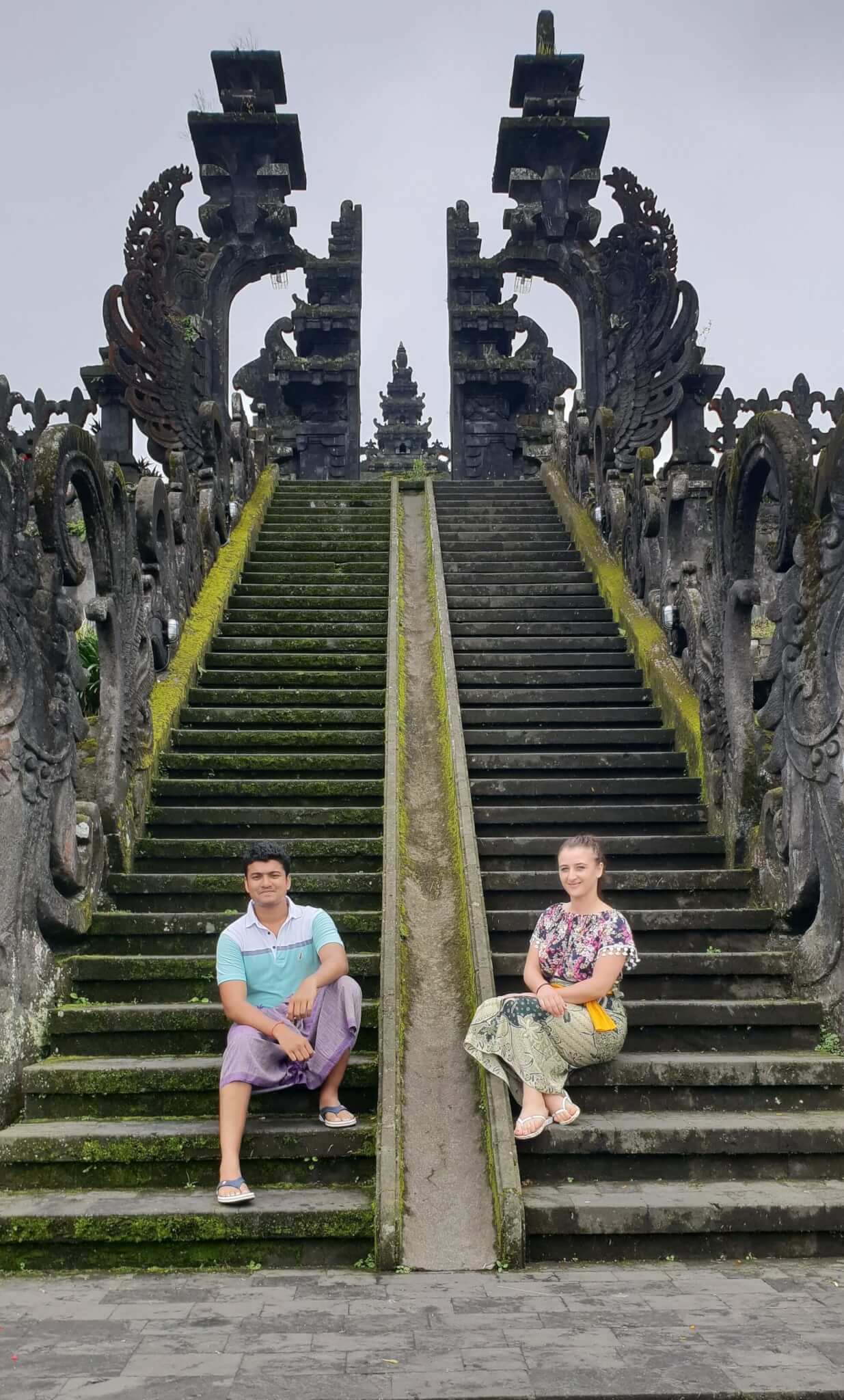 The temple has flights of stairs leading to brick gateways that in turn lead to the main spire structure, also called the Pura Penataran Agung