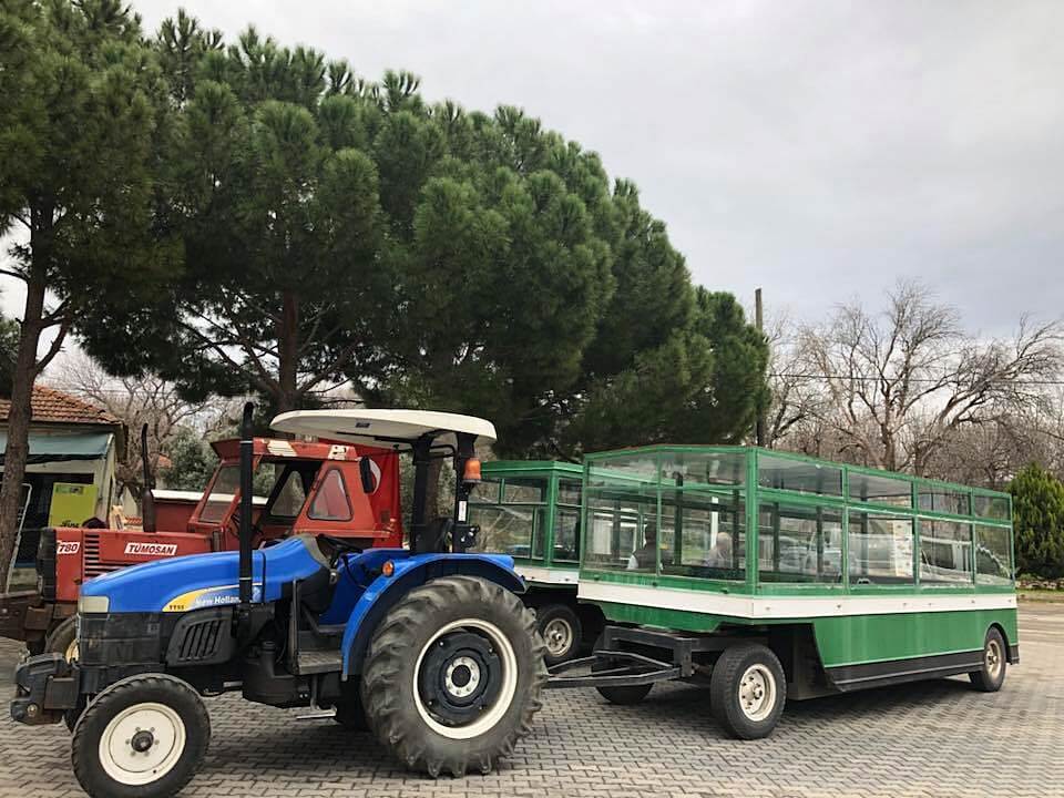A fancy compartment attached to a tractor which will drop you at the entrance of Aphrodisias
