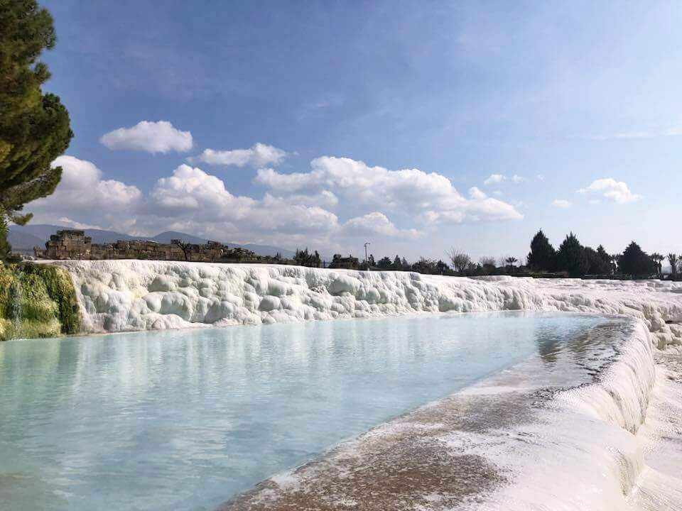 The paradisiacal spring travertine pools of Pamukkale with clean blue waters