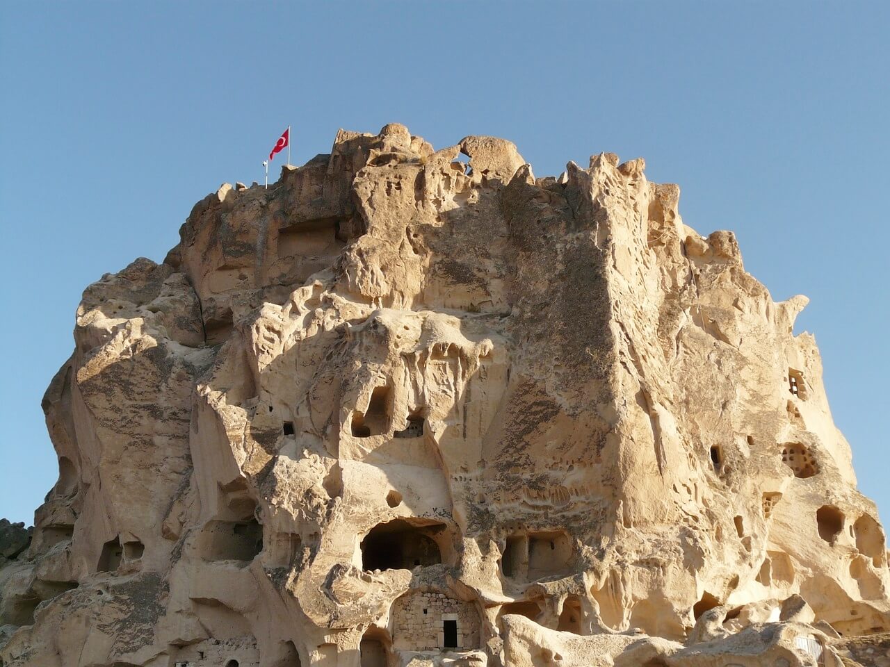 Uchisar Castle is a tall volcanic-rock outcrop situated on the highest point of the small town of Uchisar