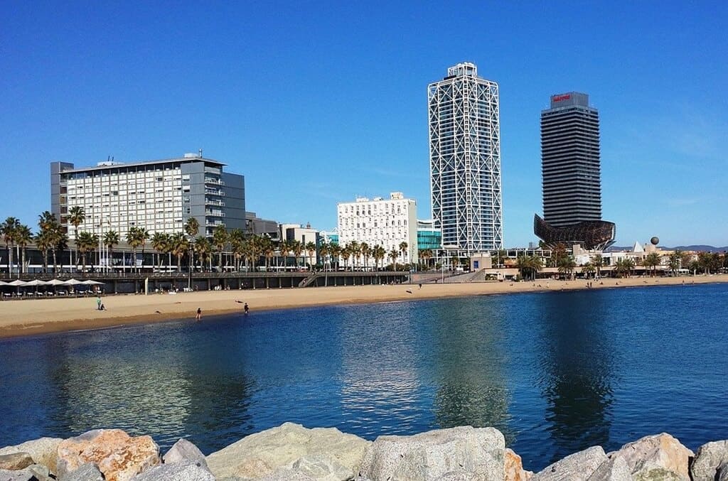 Experience the laid back vibes of Barcelona by relaxing at the beautiful Barceloneta Beach