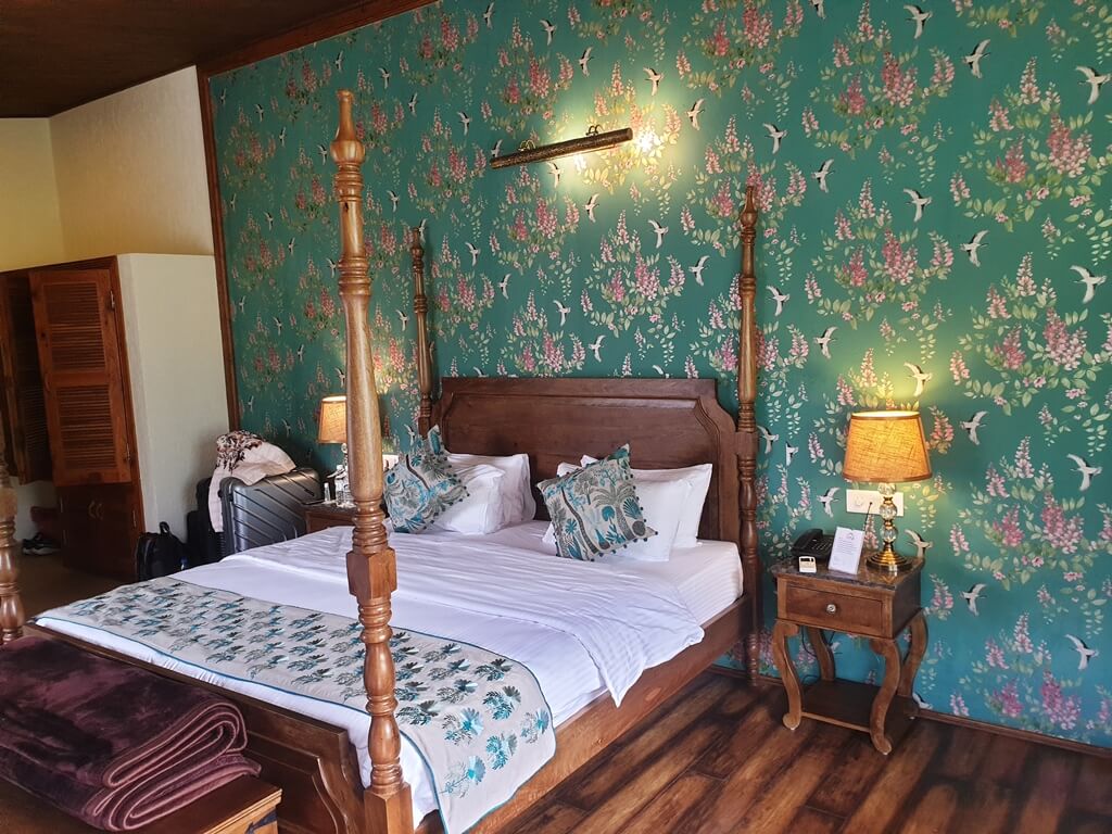 The rooms are opulent with elegantly decorated walls beautifully complimenting the wooden furniture and flooring