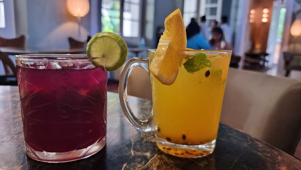A picture of the refreshingly delicious drinks served at the Coromandel Cafe called Flower Cooler and Passionfruit Twist
