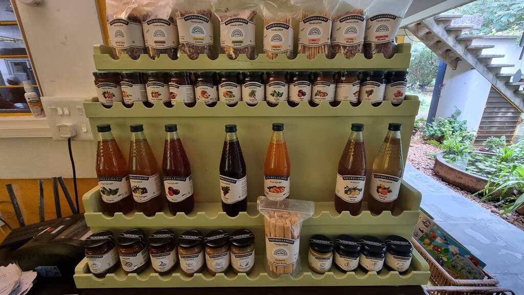 The cafe also has a store from where you can buy traditionally handcrafted organic foods like jams, nut butters, flower syrups, jellies, marmalades, and muesli