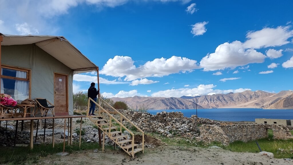 Head to your Pangong Lake accommodation to relish the gorgeous sunset and spend the night