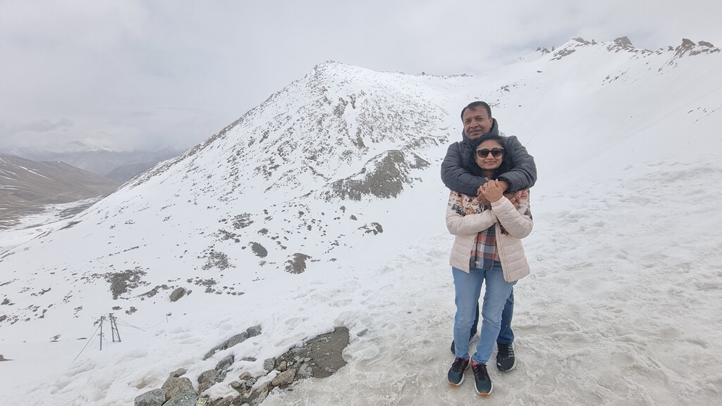 My parents enjoying the chills at the Khardung La Mountain Pass
