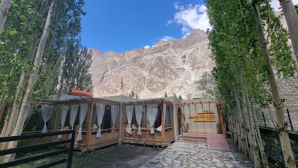 On your way back from Thang village, make a stop at an offbeat gem in your 7-day Leh Ladakh itinerary called Tyakshi Eco Village Resort for a scrumptious lunch