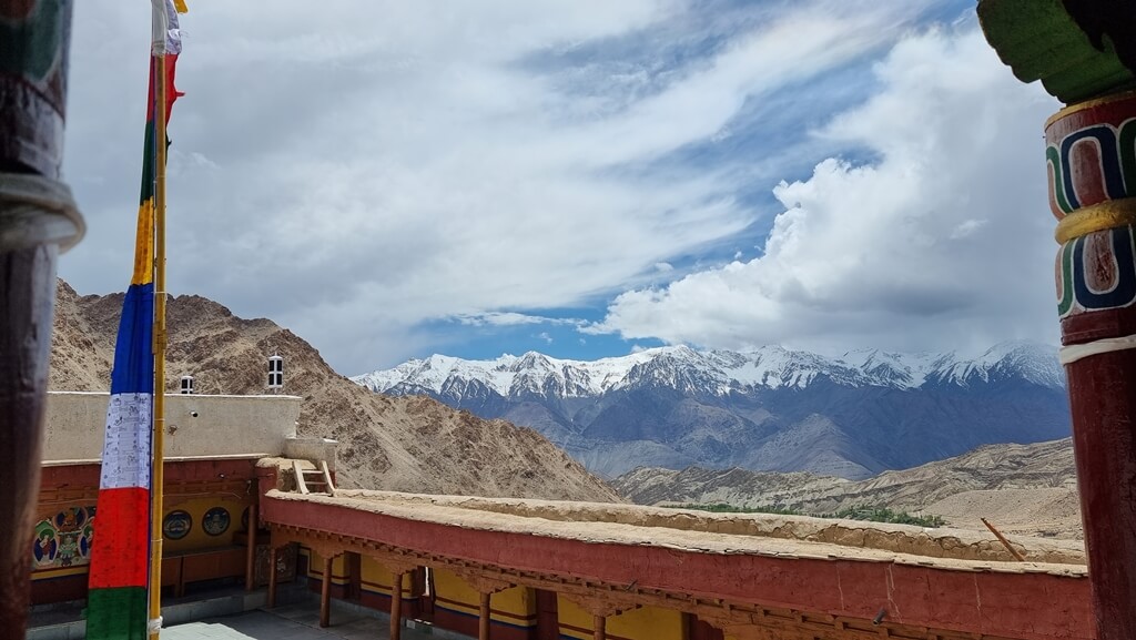 Stunning vantage view of the snow-capped mountains at the temple's entrance