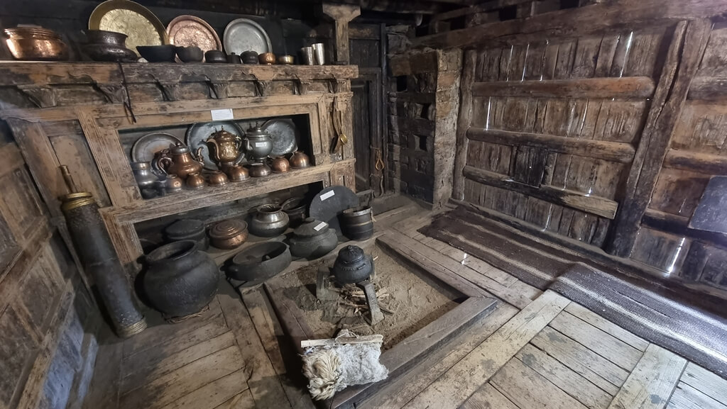Utensils, crockery, and storage articles used by villagers in the past, in one of the rooms